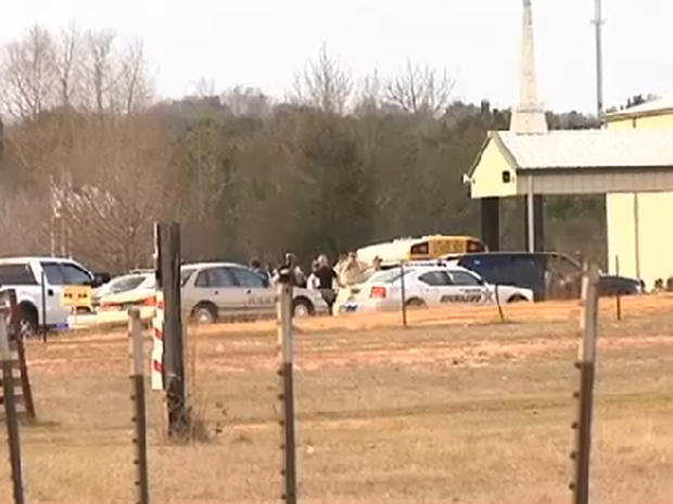 Scene outside church where hostage drama unfolded Jan. 29, 2013 in Midland City, Ala. after, sheriff says, gunman killed school bus driver and took six-year-old off bus and held him 