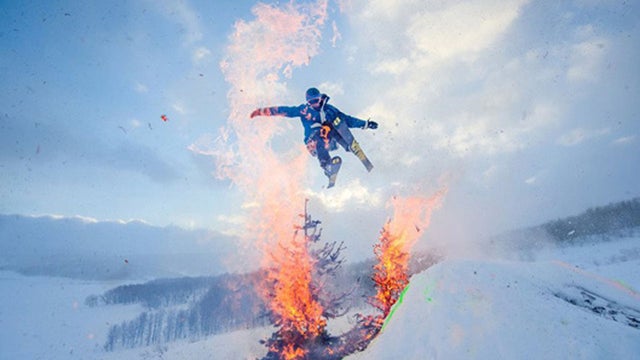 snow jump through flaming christmas trees 