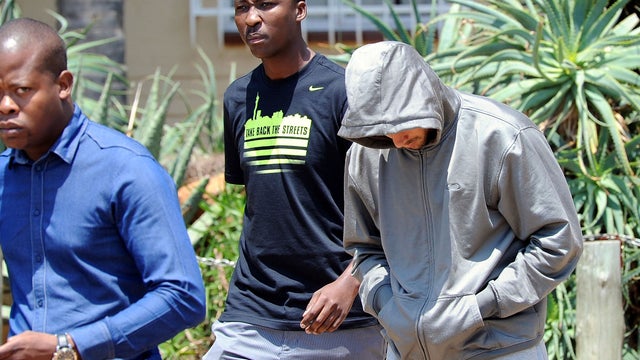 Olympic athlete Oscar Pistorius leaves the Boschkop police station 