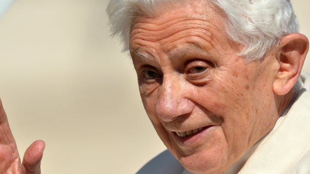 Pope Benedict XVI waves from the altar as he arrives at St. Peter's Square for his last weekly audience Feb. 27, 2013, at the Vatican. 