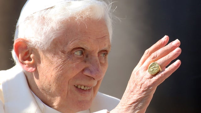  Pope Benedict XVI waves to the faithful as he leaves St Peter's Square at the end of his final general audience on February 27, 2013 in Vatican City, Vatican. 