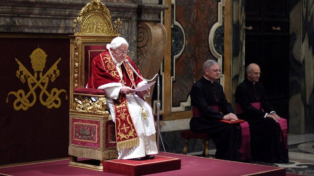 Pope Benedict XVI speaks to his cardinals during a farewell ceremony in the Clementine Hall  