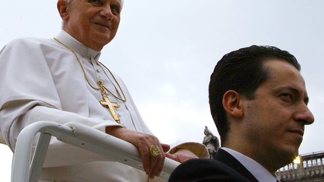 Pope Benedict XVI and butler Paolo Gabriele arrive to a weekly general audience at St. Peter's Square Oct. 10, 2006, at the Vatican. 