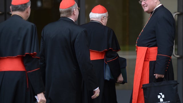 Cardinal Timothy Dolan of New York arrives for a pre-conclave meeting March 9, 2013, at the Vatican. 