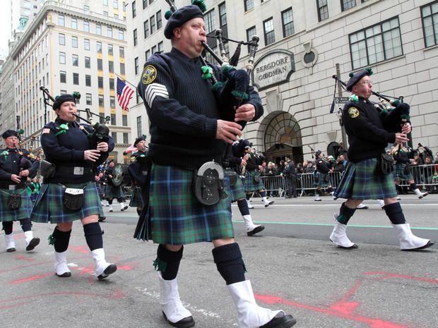 The Breezy Point Catholic Club Pipes and Drums, from the Queens borough of New York, make their way up New York's Fifth Avenue as they take part in the St. Patrick's Day Parade March 16, 2013. 