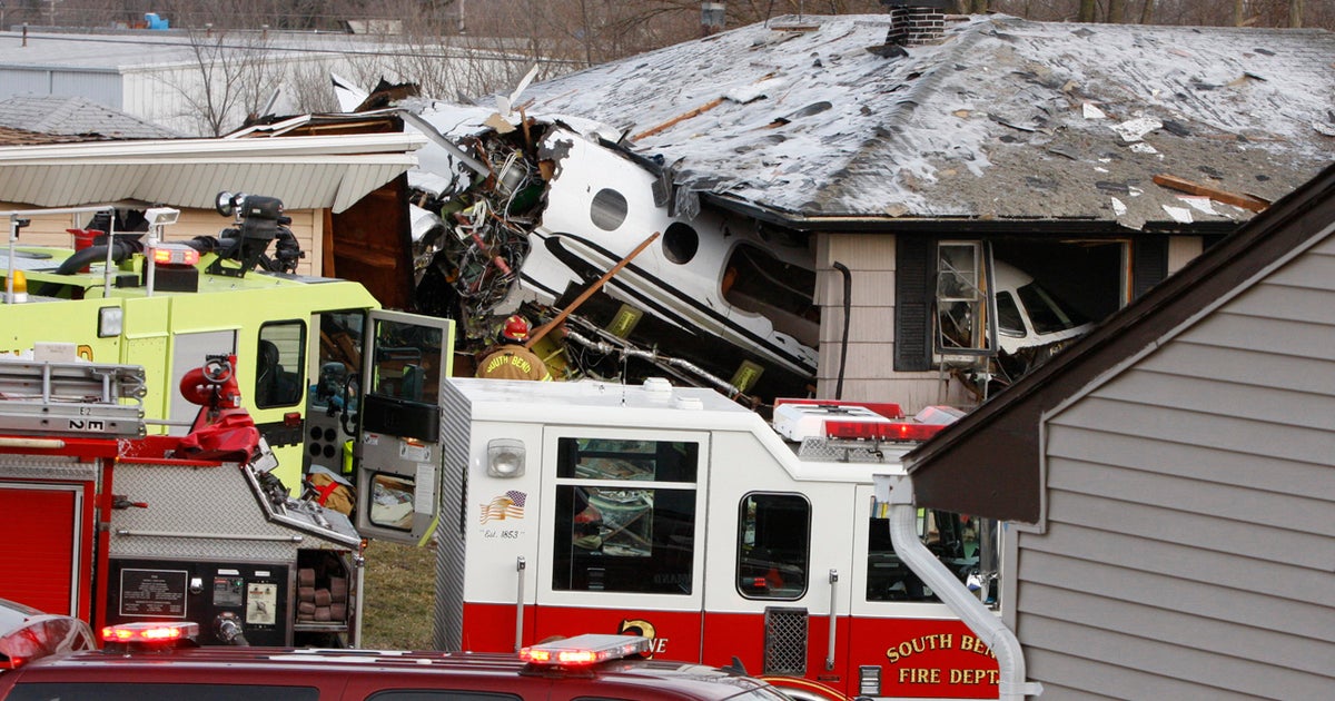 Two dead as small jet slams into three Indiana homes - CBS News
