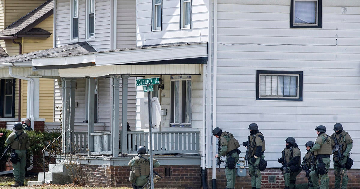 Ind. police sniper kills shooter who held child hostage - CBS News