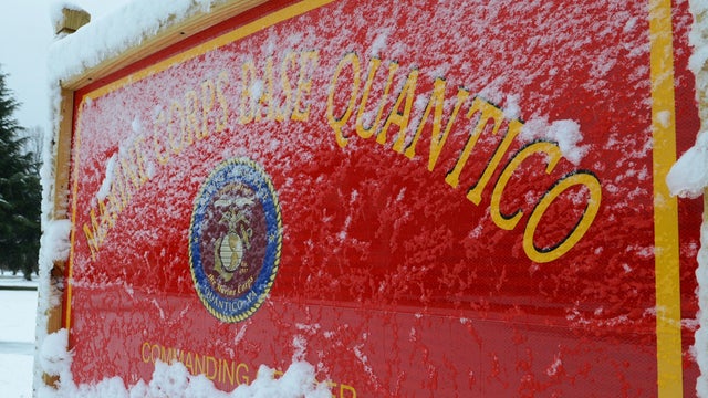 Image provided by U.S. Marine Corps shows snow covering one of Marine Corps Base Quantico&acirc;??s many signs March 6, 2013 