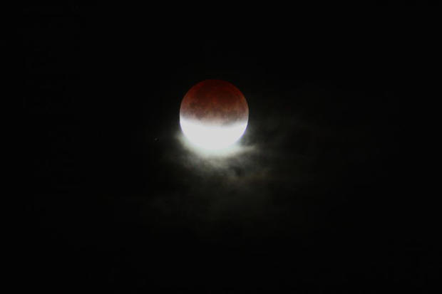 20_Eclipsed_Moon_Through_Clouds.jpg 