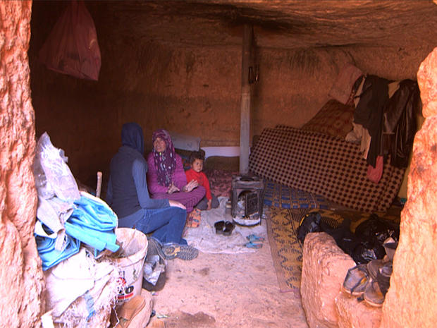 Clarissa Ward interviews a Syrian woman in her cave home 
