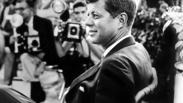 Then-Sen. John F. Kennedy is seen at a news conference in Omaha, Neb., in 1959 in this handout picture provided by the Newseum and the estate of Jacques Lowe. 