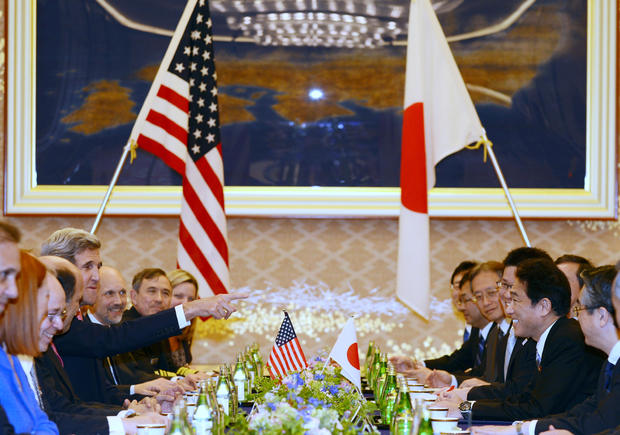U.S. Secretary of State John Kerry (5th L) gestures towards Japanese Foreign Minister Fumio Kishida (3rd R) during their talks at the foreign ministry's Iikura guesthouse in Tokyo on April 14, 2013. U.S. Secretary of State John Kerry arrived in Japan on April 14 to discuss nuclear tensions on the Korean peninsula after securing vital support from China to help defuse the weeks-long crisis 