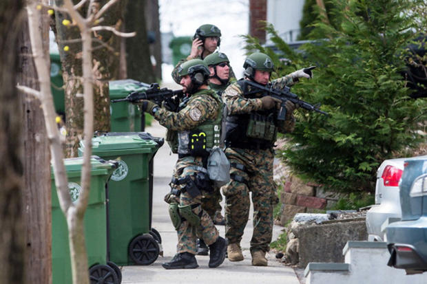 SWAT teams searched homes along Winsor Avenue in Watertown while searching for one of the two suspects in the terrorist bombing of the 117th Boston Marathon earlier this week 