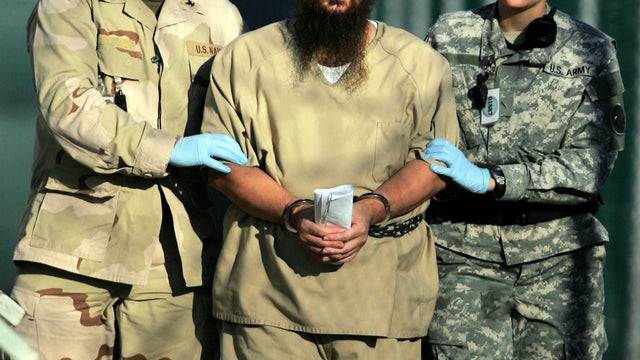 Guantanamo prisoners being force fed during hunger strike 