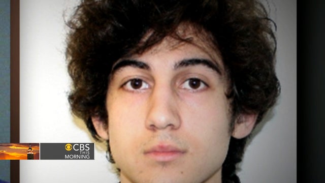 Dzhokhar Tsarnaev left a note behind in the boat he hid in as police chased him, sources tell CBS News correspondent John Miller 