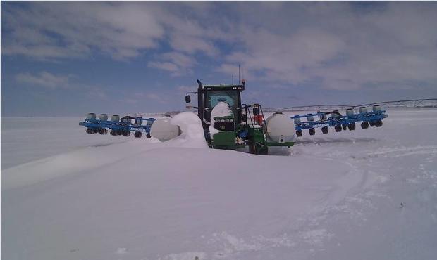 may-2-2013-snow-on-farm-equipment-charlie.jpg 
