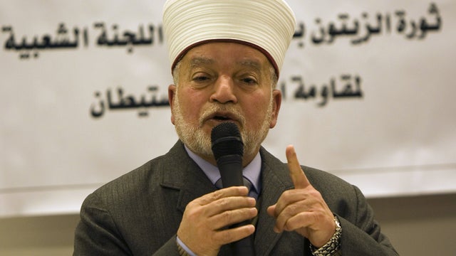 September 2006 file photo shows Mufti of Jerusalem, Mohammed Hussein, during media conference in West Bank town of Ramallah. 