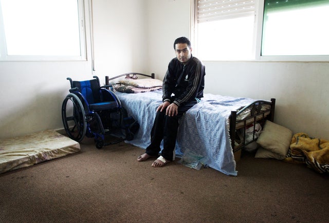 Shaher, a Syrian rebel who was paralyzed by a gunshot 