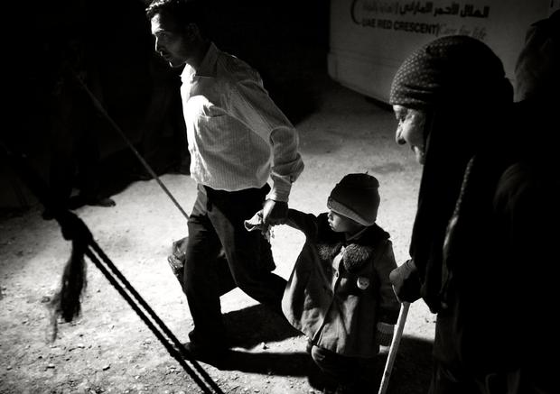 A Syrian family arrives at the Zaatari refugee camp in Jordan 