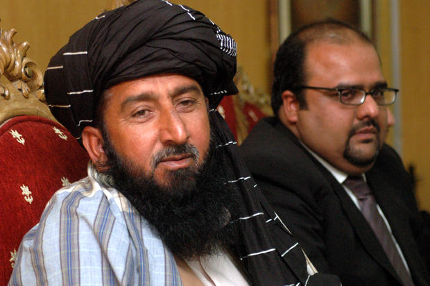 Pakistani tribesman Karim Khan (left), and his lawyer Mirza Shahzad Akbar 