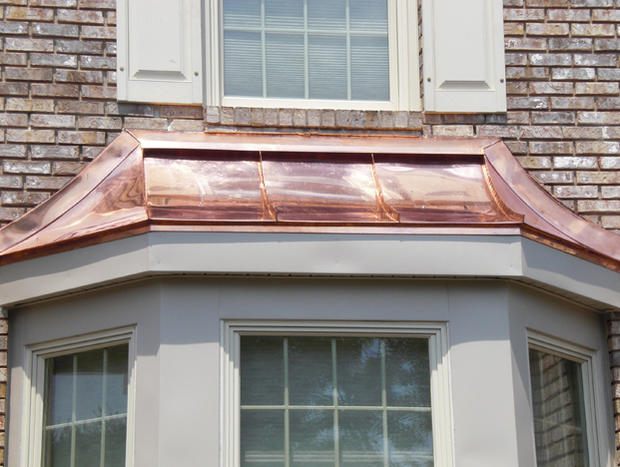 curved-metal-roof-over-bay-window.jpg 
