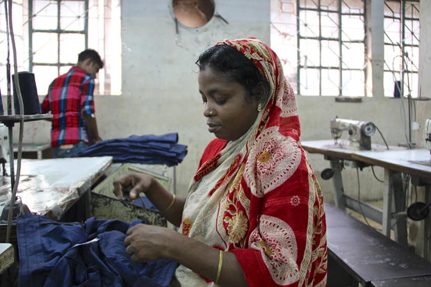 A young woman works at a garment factory in Dhaka 