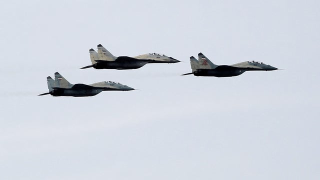 Iranian army's Mig-29 fighter jets fly during the Army Day parade in Tehran on April 18, 2013.  