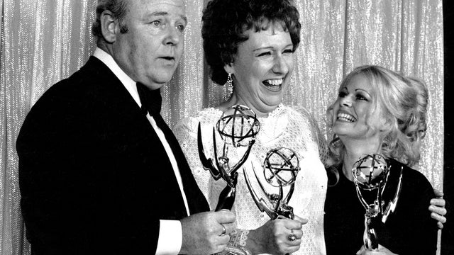 Cast members of "All in the Family," from left, Carroll O'Connor, Jean Stapleton and Sally Struthers, pose with their Emmys backstage at the 24th annual Emmy Awards in Hollywood, Calif., May 14, 1972. 