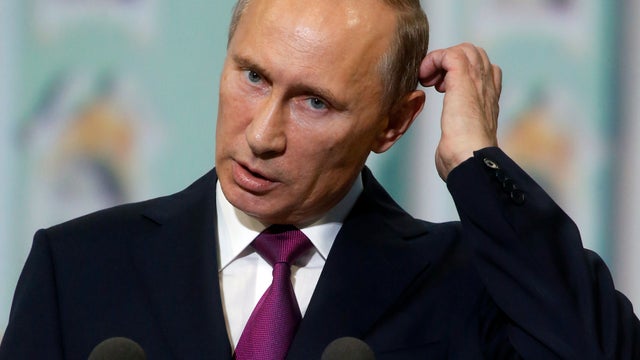 Russian President Vladimir Putin speaks at the economic forum in St.Petersburg, Russia, June 21, 2013. 