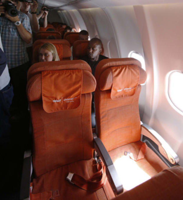 Photographers take pictures of seat 17A, the empty seat that an Aeroflot official said was booked in the name of former CIA technician Edward Snowden, on June 24, 2013. 