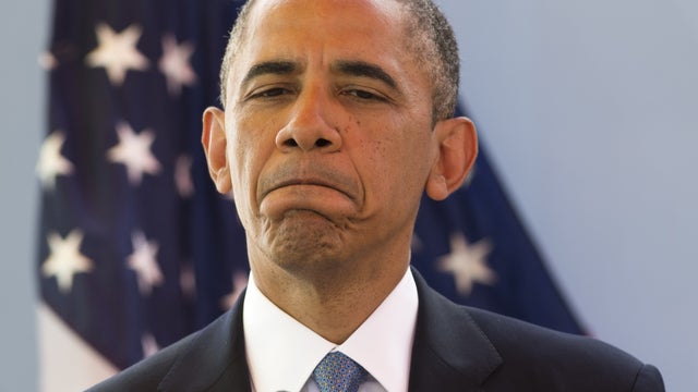 President Obama speaks during a press conference at the presidential palace in Dakar 