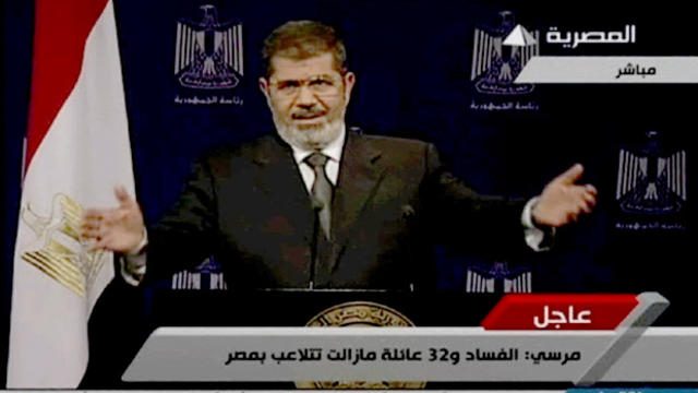 Egypt's President Mohammed Morsi addresses his country on Egyptian television July 2, 2013, amid widespread protests and an ultimatum recently given by the military. 