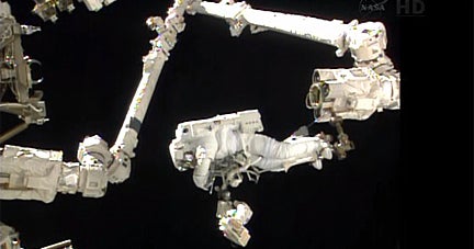 Spacewalk chips away at backlog of station tasks - CBS News