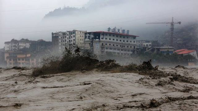 Heavy floodwaters sweep through Beichuan in southwest China's Sichuan province 