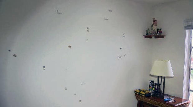 bullet-holes-in-wall.jpg 