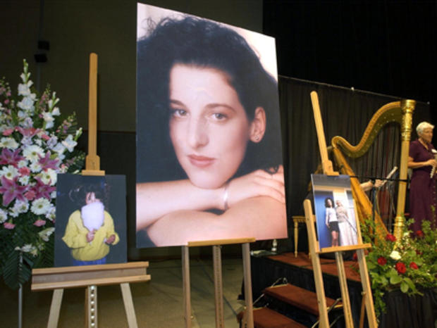Photographs of Chandra Levy are displayed during 