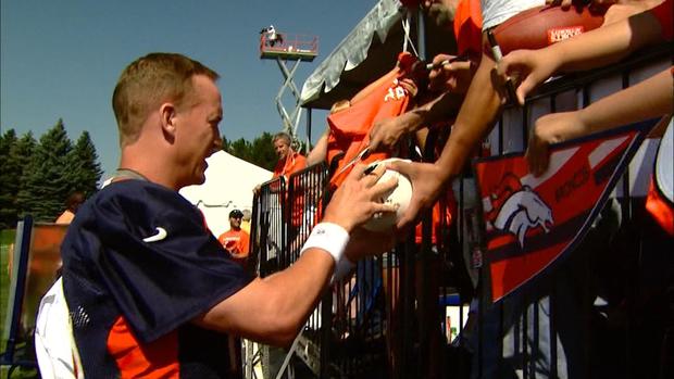 Peyton Manning signs autographs at Broncos Training Camp 