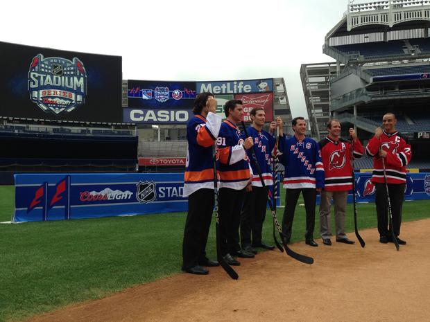 NHL players on the field at Yankee Stadium 