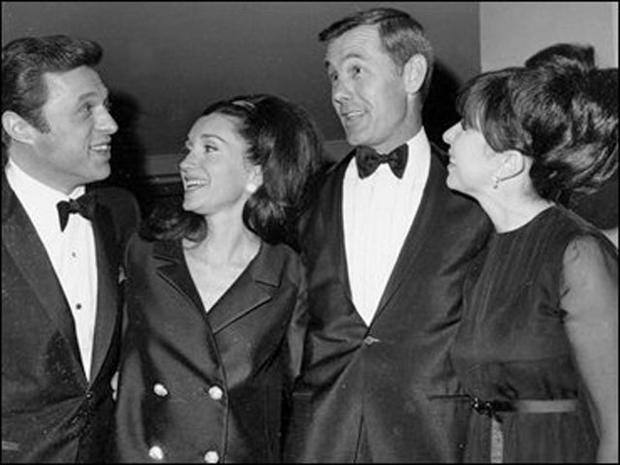 Eydie Gorme, far right, with her husband, Steve Lawrence, left, attend a party hosted by   comedian Johnny Carson, and his wife, Joanne, center, at a party hosted by Carson at the Waldorf-Astoria Hotel in New York, May 10, 1967.  