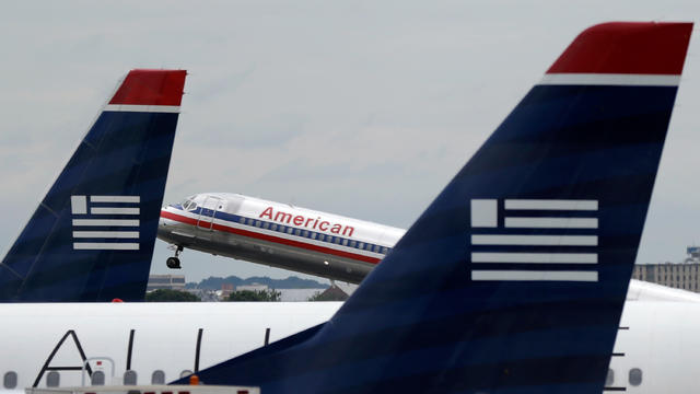 DOJ blocks U.S. Airways, American Airlines merger 