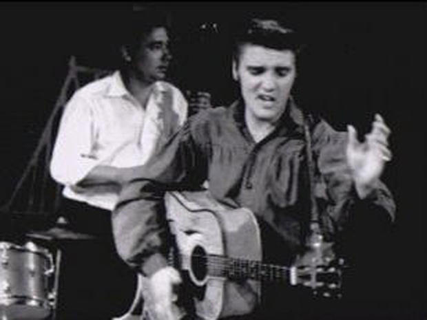 Elvis Presley performs on "The Ed Sullivan Show" on Sept. 9, 1956. 