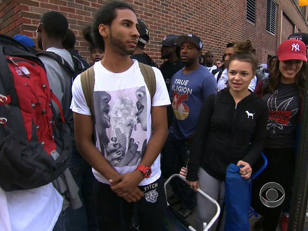 Job-seekers line up for a carpenter apprenticeship in New York in a "CBS Evening News" segment broadcast Aug. 21, 2013. 