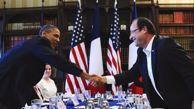 President Obama shakes hands with French President Francois Hollande  