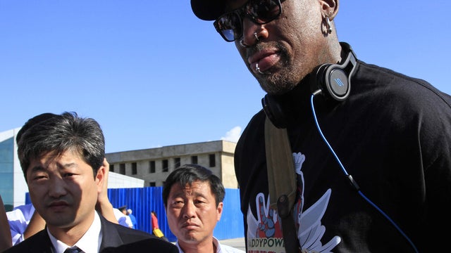 Former NBA star Dennis Rodman arrives at Pyongyang airport 