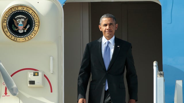 President Obama steps off Air Force One as he arrives for the G-20 summit in St. Petersburg 