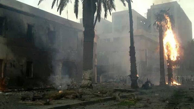 Damage is seen to a Libyan Foreign Ministry office and surrounding buildings after an explosion in Benghazi 