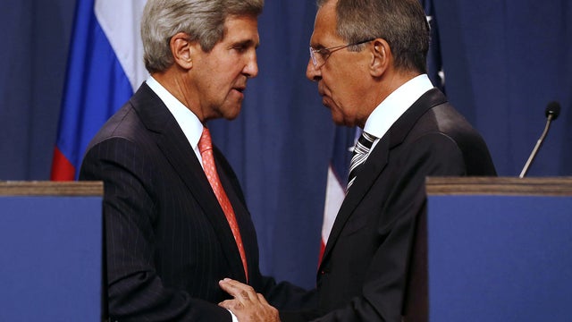 U.S. Secretary of State John Kerry, left, and Russian Foreign Minister Sergey Lavrov shake hands at the end of a press conference in Geneva Sept. 14, 2013, after reaching an agreement on Syria's chemical weapons. 