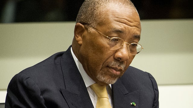 Former Liberian President Charles Taylor waits in the courtroom of the Special Court for Sierra Leone in The Hague 