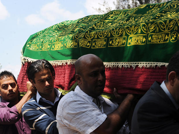 Pallbearers carry the coffin of Kenyan journalist Ruhila Adatia-Sood during a funeral ceremony in Nairobi, Kenya, Sept. 26, 2013. 