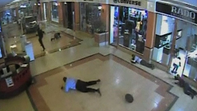 Surveillance video shows terrified people crawling for cover as terrorists attacked the Westgate Mall in Nairobi, Kenya, on Sept. 21, 2013. 